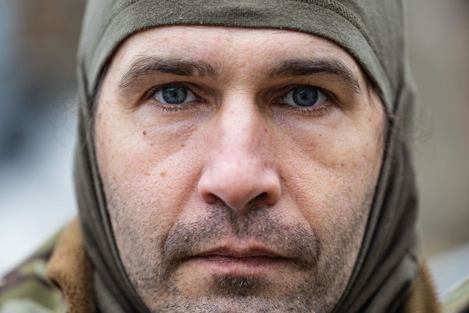 Close-up portrait of Caesar, a 50-year-old Russian fighting with the Freedom of Russia Legion in Ukraine.