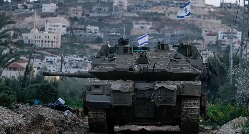 Israel moves tanks into West Bank for first time since 2002