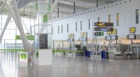 Empty airport check-in counters.