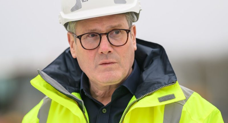 Prime Minister Keir Starmer at a housing construction site.