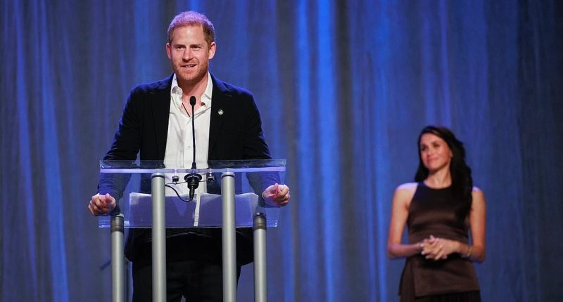 Meghan looks on lovingly as Prince Harry opens Invictus Games
