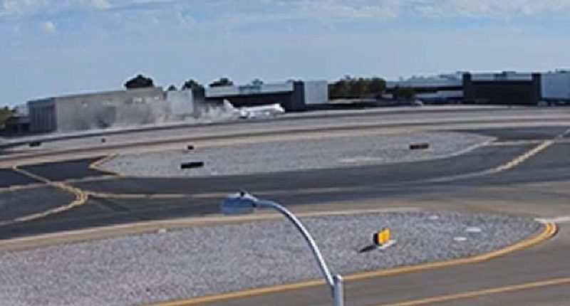 Moment Motley Crue singer's plane crashes into jet on runway