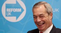 Nigel Farage, leader of the Reform UK party, smiling.
