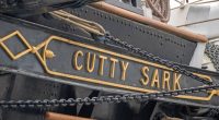 Close-up of the Cutty Sark's nameplate.