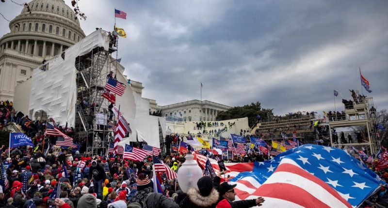 Pro-Trump supporters clashing with police at the US Capitol.