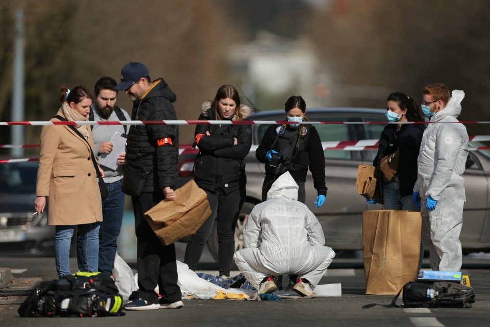 Police officers and forensic investigators at a crime scene.