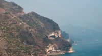 People are just realising a picturesque clifface looks like a giant dozing PUPPY… & it’s sparked a surprise tourist boom