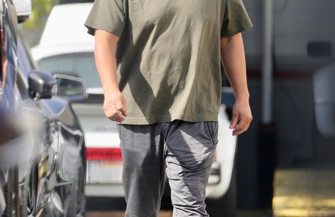 Edwin Castro, Powerball jackpot winner, leaving a car dealership.