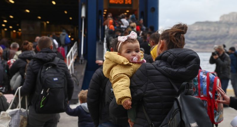 People evacuating Santorini after a series of earthquakes.