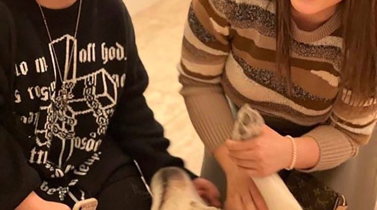 Estate agent Anastasia Milosskaya with her daughter and dog.