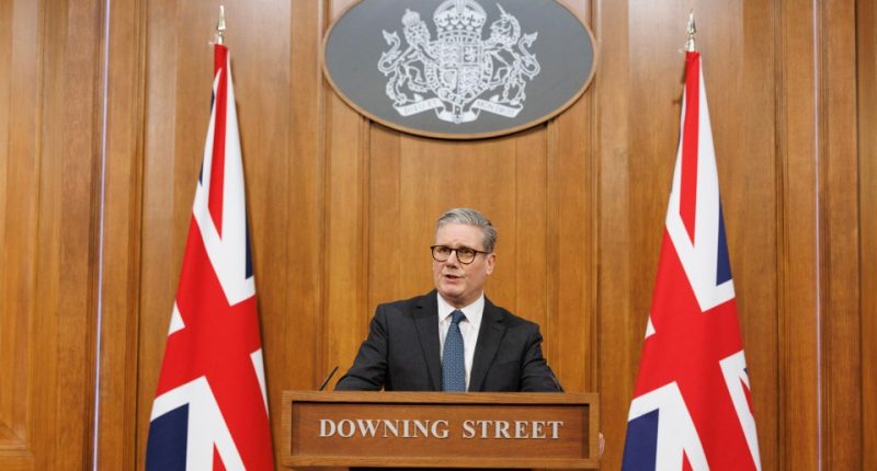 Keir Starmer giving a press statement at 10 Downing Street.