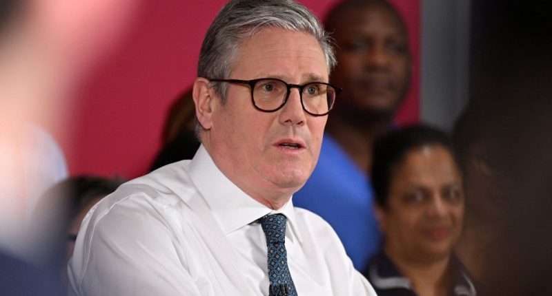 Keir Starmer speaking at a healthcare provider.