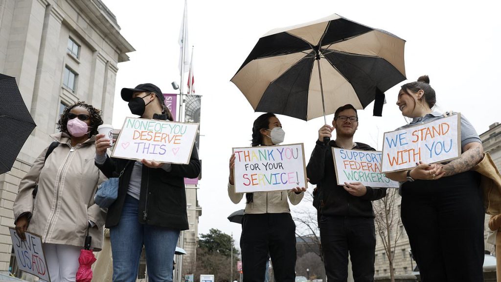 Tears and chocolates outside USAID as feds empty their desks