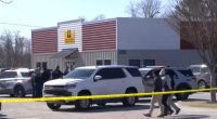 Crime scene at Louisville DMV following a shooting.