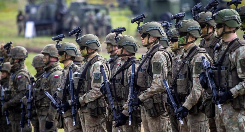Lithuanian and Polish soldiers participating in a military exercise.