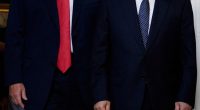 Donald Trump and Vladimir Putin in suits.