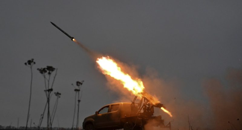 A rocket launching from a truck.