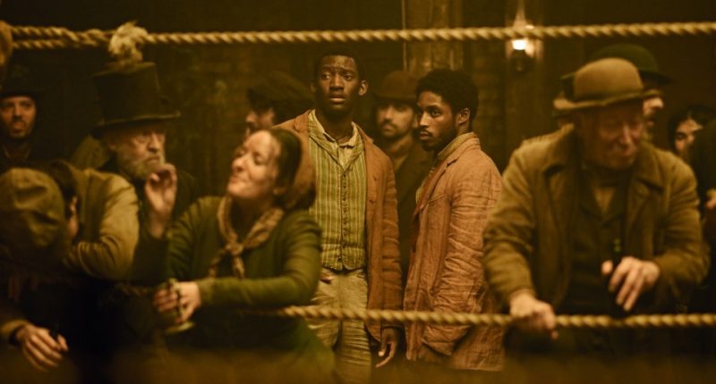 Scene from A Thousand Blows showing Malachi Kirby as Hezekiah Moscow Goodson and Francis Lovehall as Alec.