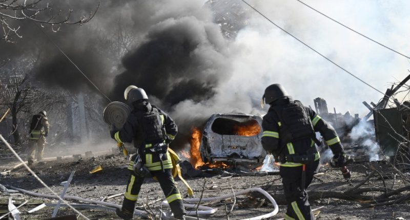 Firefighters at the site of a strike in Kramatorsk, Ukraine.