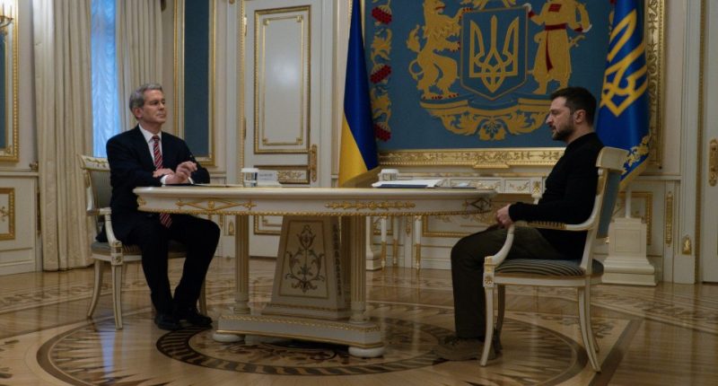 Scott Bessent, U.S. Treasury Secretary, left, and Ukraine's President Volodymyr Zelenskyy, speak during a meeting in Kyiv, Ukraine, Wednesday, Feb. 12, 2025. (AP Photo/Alex Babenko)