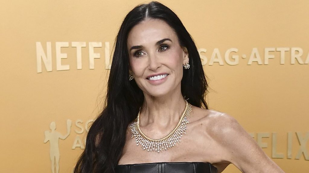 2025 SAG Awards: Demi Moore, 62, shows off lithe frame in skintight black dress as she is up for The Substance