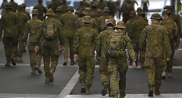 Members of the Australian Defence Force walk through the city on July 27, 2020 in Melbourne, Australia. Victoria has recorded 532 new cases of coronavirus and six more deaths.