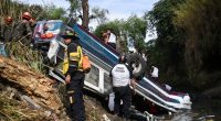 At least 50 die in Guatemala after bus plunges off bridge