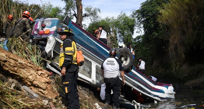 At least 50 die in Guatemala after bus plunges off bridge