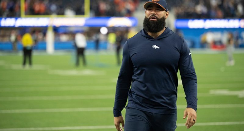 Broncos coach arrested, booked into Denver jail