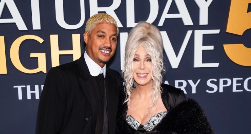 Cher and AE Edwards Enjoy Loved-Up ‘SNL 50’ Red Carpet Appearance