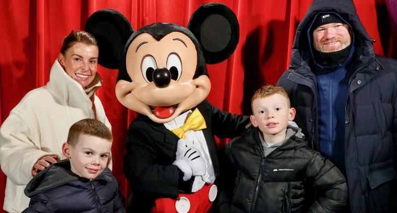 Coleen and Wayne Rooney dote over Kit and Cass in Disneyland