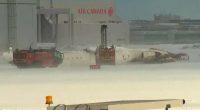 Delta flight crashes at Toronto Airport after landing, flips upside down