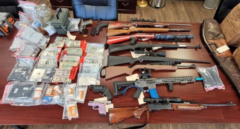 Firearms, drugs, $11k seized by Russell County authorities