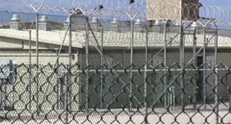 Guantanamo Bay: First military flight lands with migrants deported from the US, carrying 'worst of the worst'