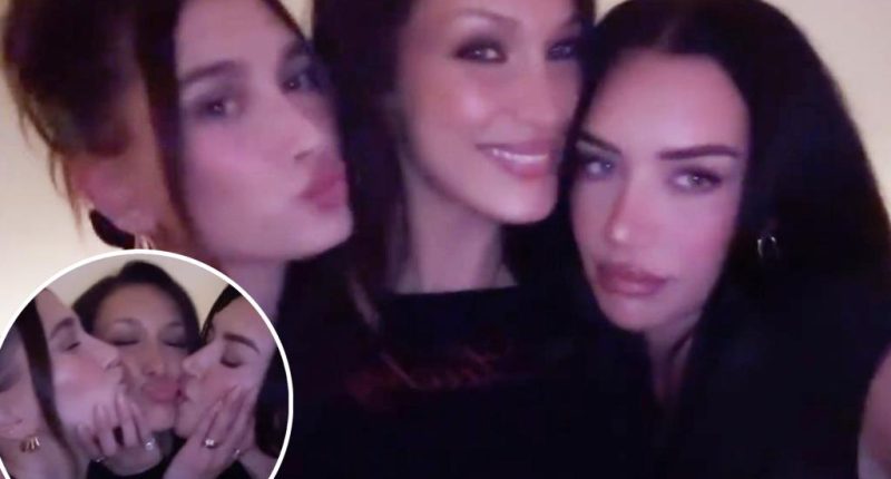 Hailey Bieber, Bella Hadid and Stassie Karanikolaou pucker up for three-way kiss on girls’ night out