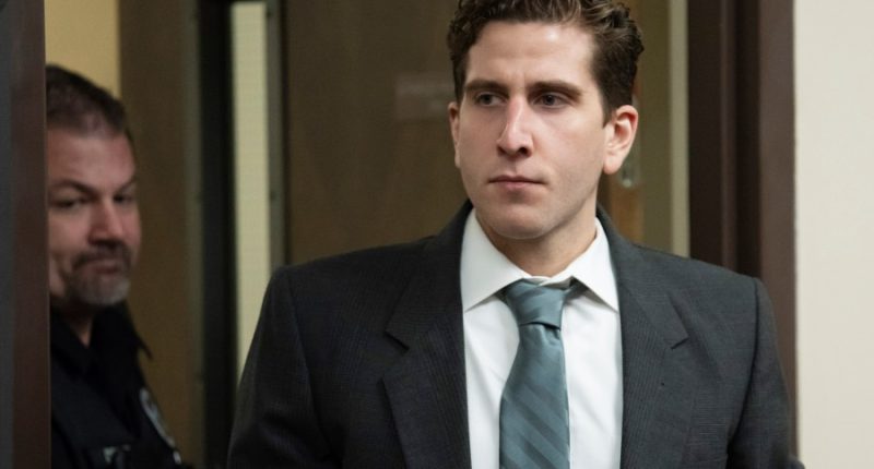 Bryan Kohberger is escorted into a courtroom for a hearing.