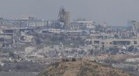 Israeli soldiers take positions near the border with Gaza in southern Israel.