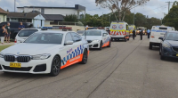 Man fighting for life after brawl of up to 40 people with machetes, bats