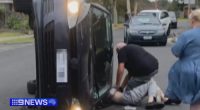 The 66-year-old performed a citizen's arrest on a 16-year-old boy as he tried to exit the car, holding him down until police arrived about 3.30pm.