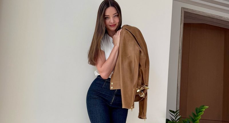 Miranda Kerr shows off her long legs in high rise skinny jeans