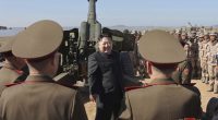 In this undated photo provided Oct. 6, 2024, by the North Korean government, its leader Kim Jong Un, centre, visits an artillery exercise at an undisclosed place in North Korea.