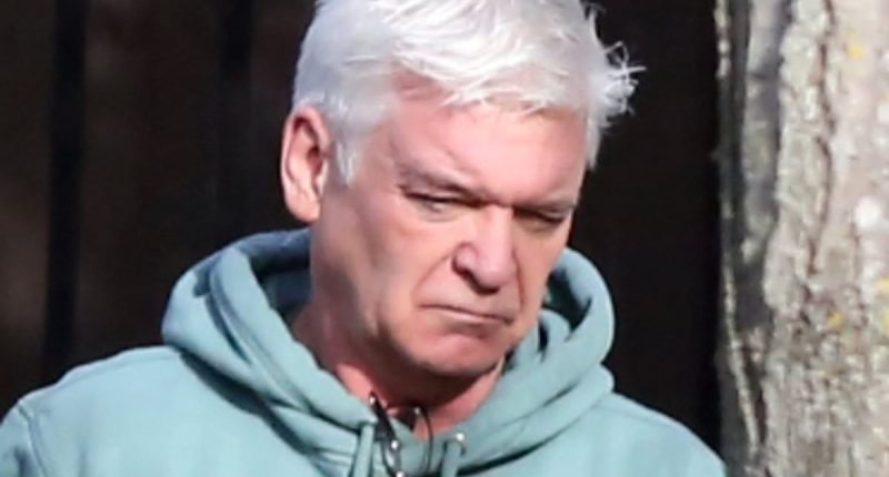 Phillip Schofield looks downcast as he puts the bins out hours after ex co-star Holly Willoughby was the talk of the town while promoting huge TV comeback show Celebrity Bear Hunt