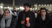Catholic faithful attend a nightly rosary prayer service for the health of Pope Francis in St. Peter's Square at the Vatican. (AP Photo/Mosa'ab Elshamy)