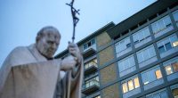 Pope spends quiet first night in hospital, continues drug therapy and reads papers, Vatican says