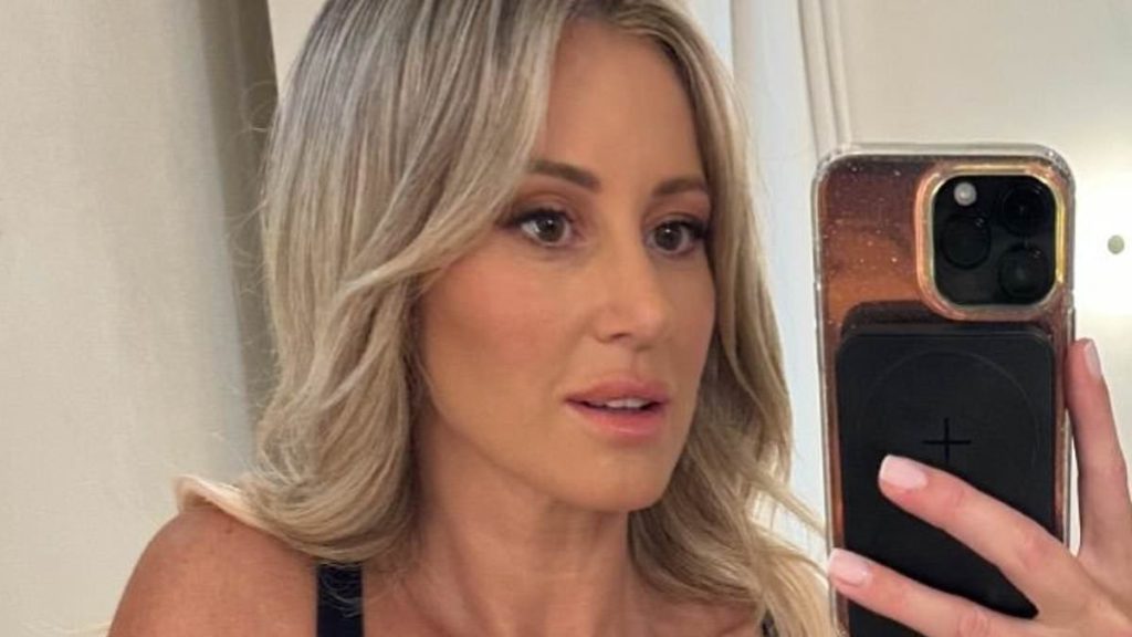 Roxy Jacenko flaunts her wealth as she parties it up in front-row seats at Drake's Sydney concert following cancer scare