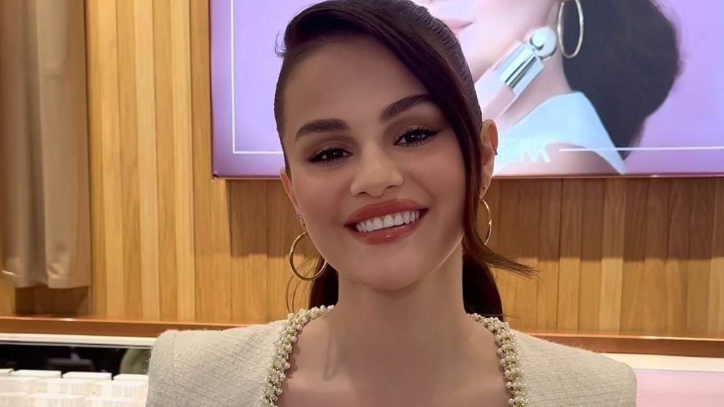 Selena Gomez looks sensational as she hits London in white mini dress