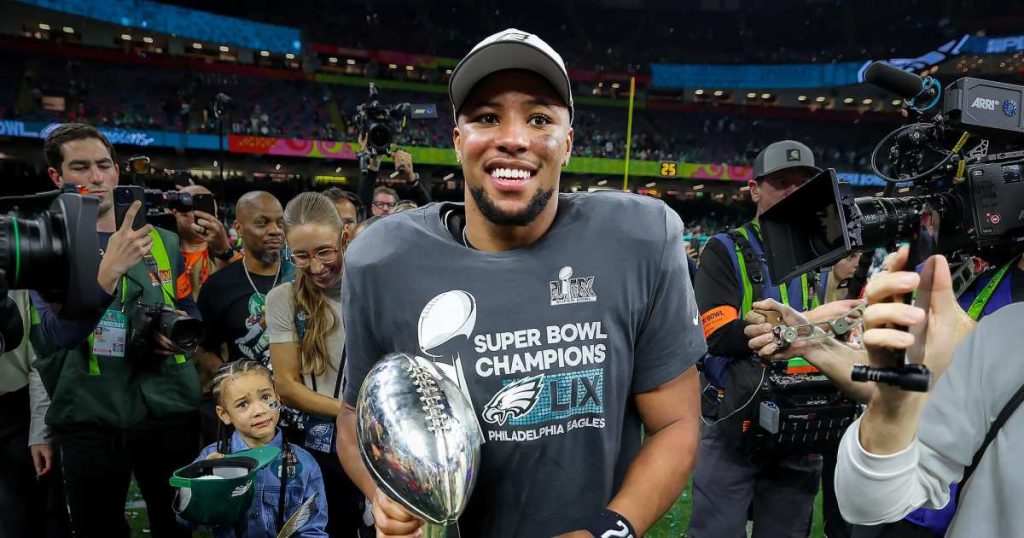 Shirtless Saquon Barkley Shotguns Beers in Locker Room After Super Bowl