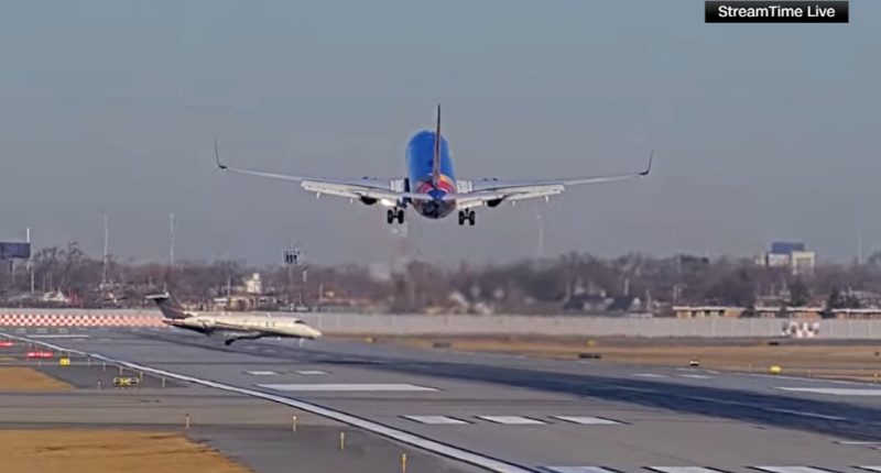 Southwest flight 2504 from Omaha, NE to Chicago lands safely after close call with Flexjet private aircraft at Midway airport