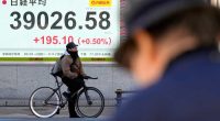 Stock market today: Asian shares rise following Wall Street rally on healthy earnings