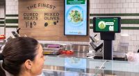 Woolworths will soon bring advertisements to deli and checkout screens in stores across Australia.